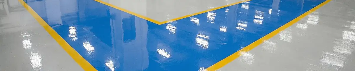 A factory floor professionally covered and marked with epoxy flooring in Allentown, PA