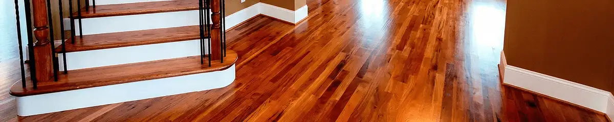Base floor of a staircase with professionally restored wood flooring in Allentown PA