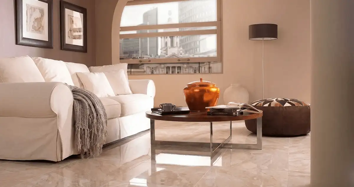 Modern living room with professionally installed marble flooring, a beige sofa, coffee table in Allentown, PA