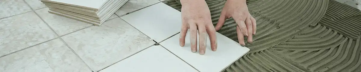 Professional installing white tile floors in Allentown, PA
